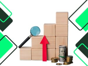 financial goals for the future: wooden-blocks-with-magnifying-glass-and-growth-arrow